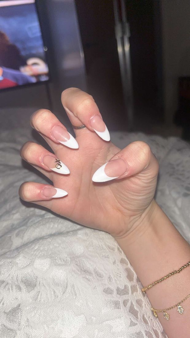 Long almond nails with classic white French tips